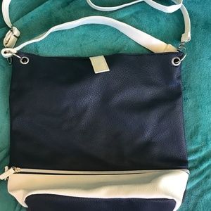 Large blue white bag/purse with small blue zippered bag and round mirror